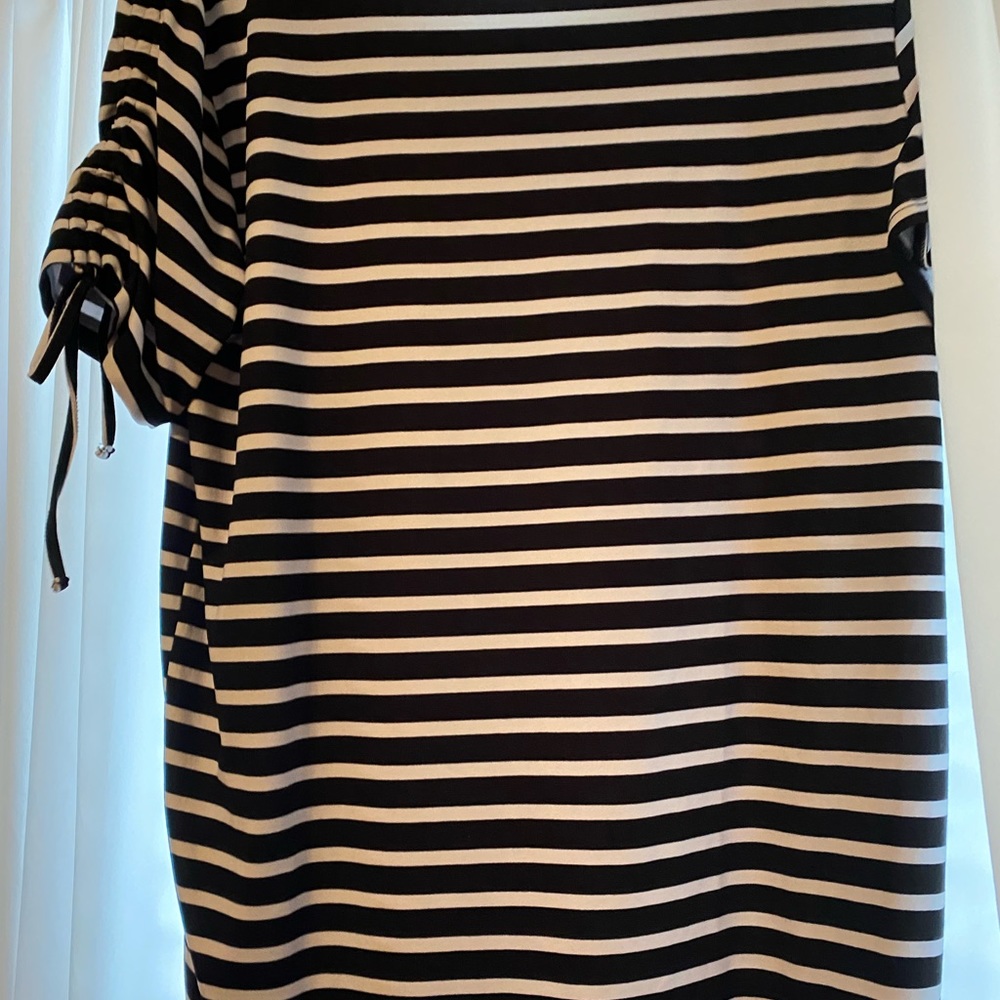 Black/white striped shirt tag removed. Size large